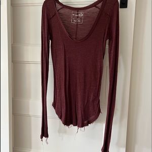 FREE PEOPLE maroon thin long sleeve top with fringe detail